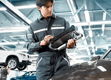 BMW vehicle receiving professional service
