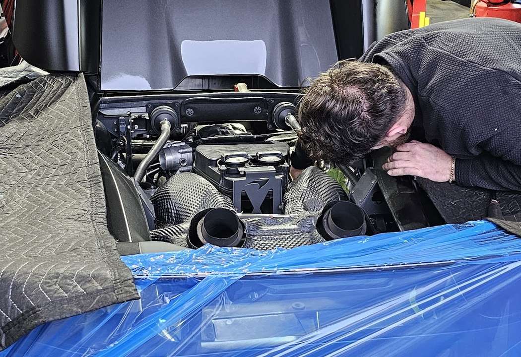 Automotive service facility shown on the original Land Rover page
