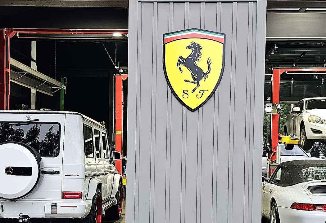 European vehicles inside the original business workshop